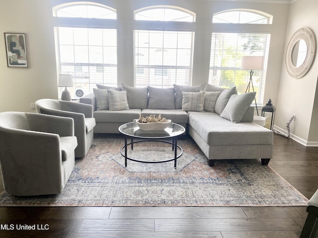 2252 Beach Dr Unit 203, Gulfport, MS 39507 - living room with healthy amount of natural light and wood finished floors