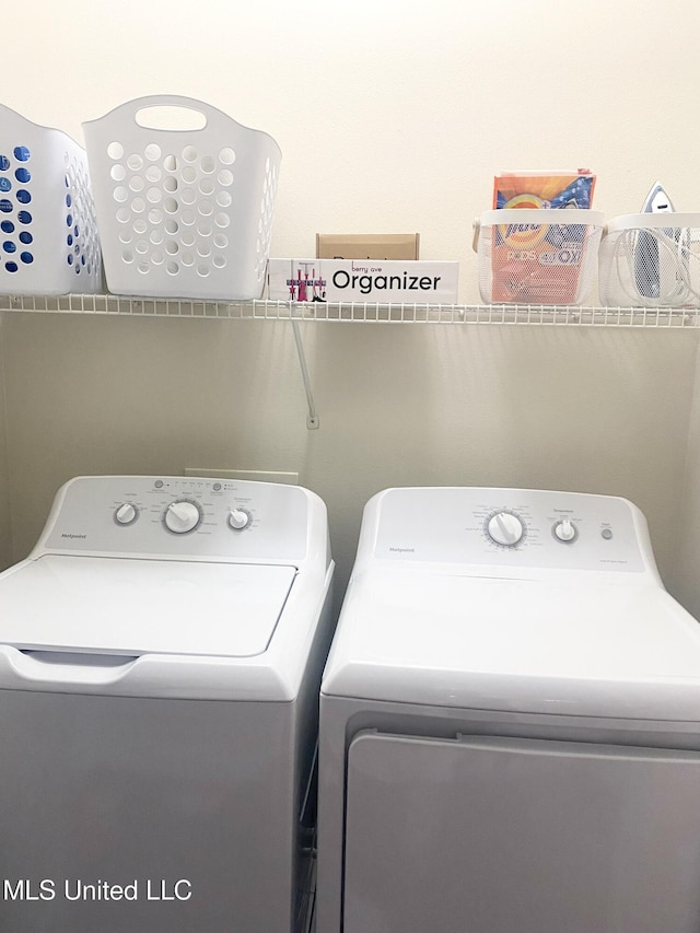 2252 Beach Dr Unit 203, Gulfport, MS 39507 - laundry room with independent washer and dryer