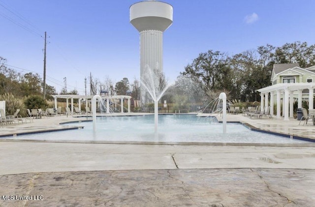 2252 Beach Dr Unit 203, Gulfport, MS 39507 - view of property's community featuring a pergola, a pool, and a patio area