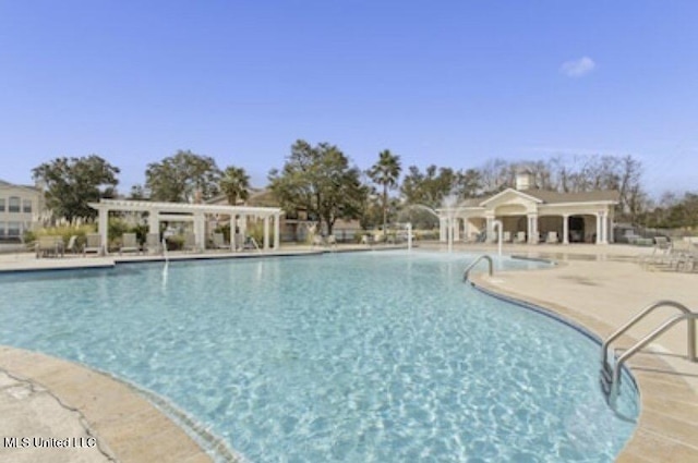 2252 Beach Dr Unit 203, Gulfport, MS 39507 - community pool featuring a pergola and a patio