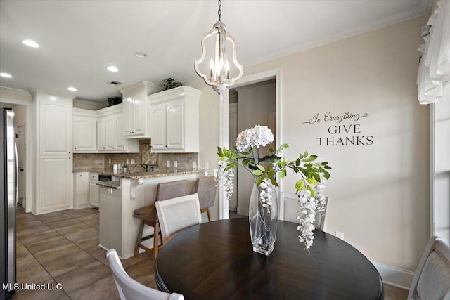 dining area with recessed lighting, tile patterned floors, visible vents, and ornamental molding