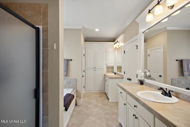 full bathroom with crown molding, a sink, two vanities, a garden tub, and a stall shower