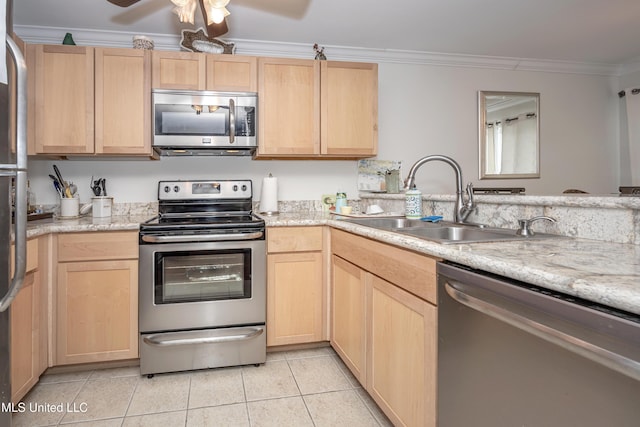 3230 Cumberland Rd Unit 18, Ocean Springs, MS 39564 - kitchen featuring light brown cabinetry, stainless steel appliances, crown molding, and a sink