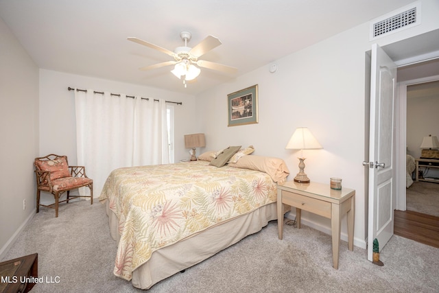 3230 Cumberland Rd Unit 18, Ocean Springs, MS 39564 - carpeted bedroom with baseboards, a ceiling fan, and visible vents