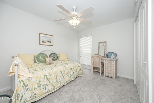 3230 Cumberland Rd Unit 18, Ocean Springs, MS 39564 - bedroom featuring baseboards, ceiling fan, and carpet