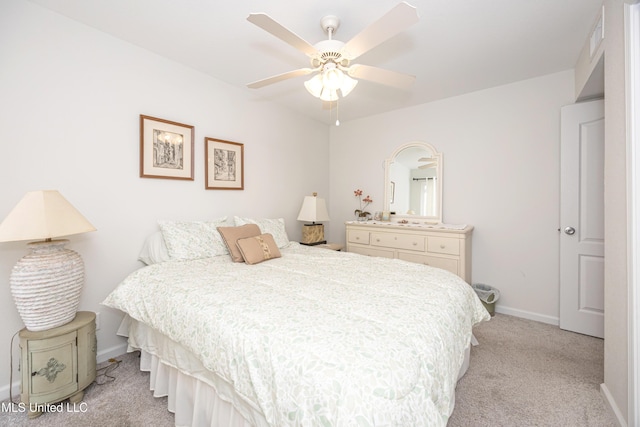 3230 Cumberland Rd Unit 18, Ocean Springs, MS 39564 - bedroom with baseboards, ceiling fan, and light carpet