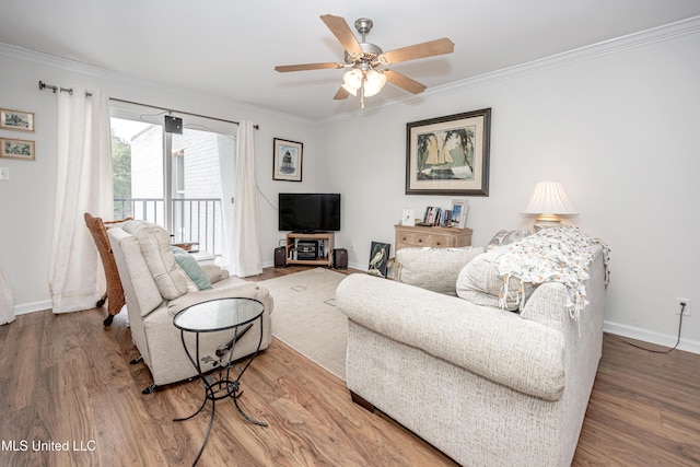3230 Cumberland Rd Unit 18, Ocean Springs, MS 39564 - living area featuring baseboards, ornamental molding, a ceiling fan, and wood finished floors