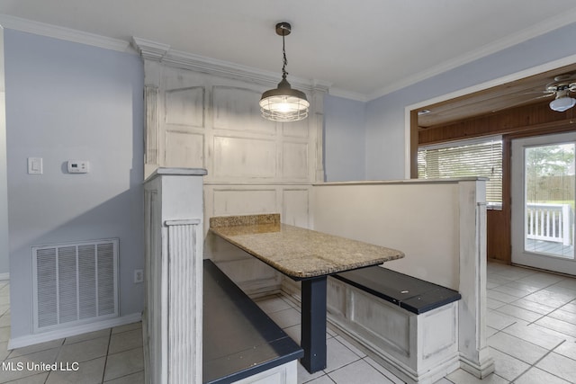 18401 Dogwood Ln, Saucier, MS 39574 - kitchen with visible vents, ornamental molding, breakfast area, pendant lighting, and light tile patterned flooring