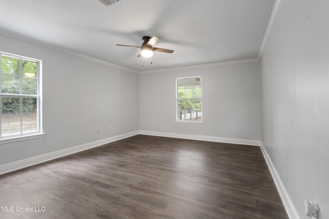 18401 Dogwood Ln, Saucier, MS 39574 - empty room with visible vents, baseboards, dark wood-style flooring, a ceiling fan, and crown molding