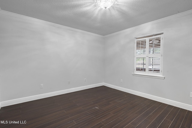 18401 Dogwood Ln, Saucier, MS 39574 - empty room featuring dark wood-type flooring, baseboards, a textured ceiling, and ornamental molding