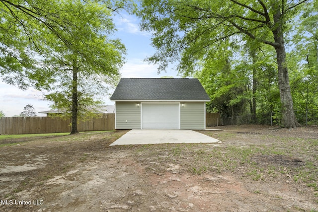 18401 Dogwood Ln, Saucier, MS 39574 - detached garage with driveway and fence