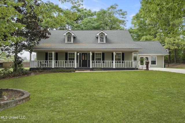 18401 Dogwood Ln, Saucier, MS 39574 - view of front facade featuring a front lawn, a shingled roof, and covered porch