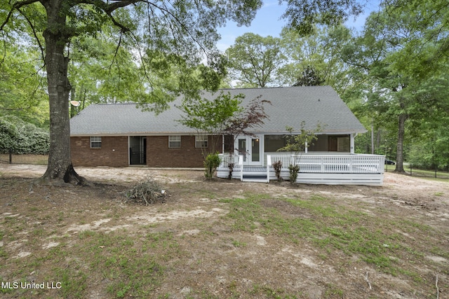 18401 Dogwood Ln, Saucier, MS 39574 - back of house with a shingled roof and covered porch