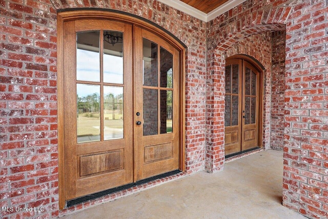 entrance to property featuring french doors