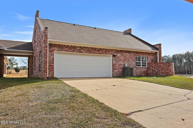 view of home's exterior featuring cooling unit, a yard, and a garage