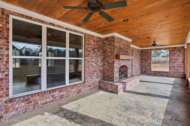 view of patio featuring ceiling fan and an outdoor brick fireplace