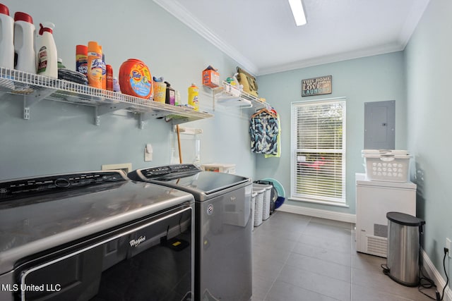 clothes washing area featuring laundry area, electric panel, ornamental molding, tile patterned flooring, and separate washer and dryer