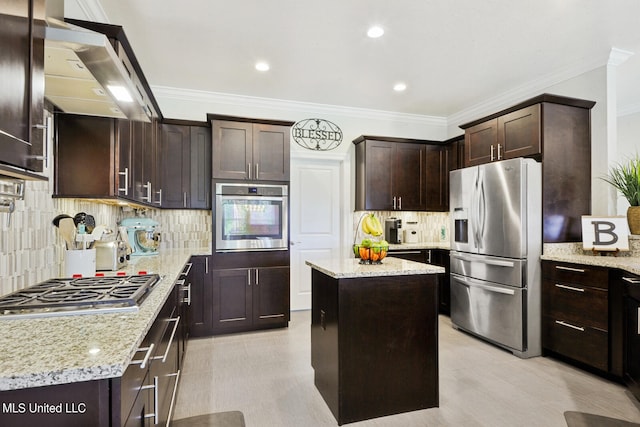 kitchen with a kitchen island, extractor fan, stainless steel appliances, crown molding, and light stone counters