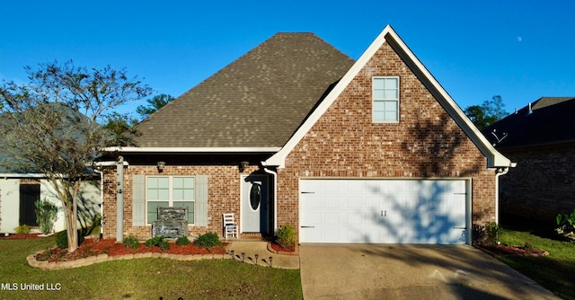 view of front of property featuring a garage