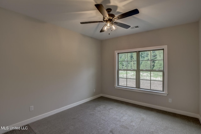 carpeted empty room with ceiling fan