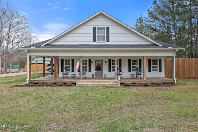 148 Stanton Hall Dr, Florence, MS 39073 - farmhouse-style home featuring a shingled roof and a porch