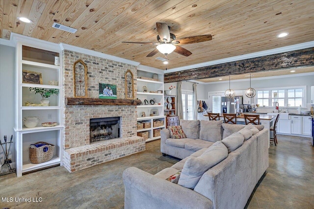 148 Stanton Hall Dr, Florence, MS 39073 - living area featuring ornamental molding, wooden ceiling, ceiling fan, built in shelves, and a brick fireplace