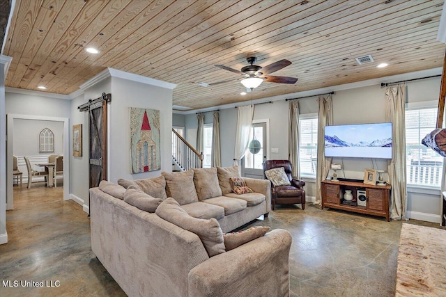 148 Stanton Hall Dr, Florence, MS 39073 - living area featuring a barn door, recessed lighting, ornamental molding, wood ceiling, and finished concrete flooring