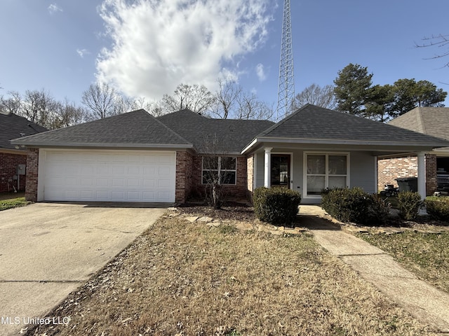 ranch-style home featuring concrete driveway, brick siding, roof with shingles, and an attached garage