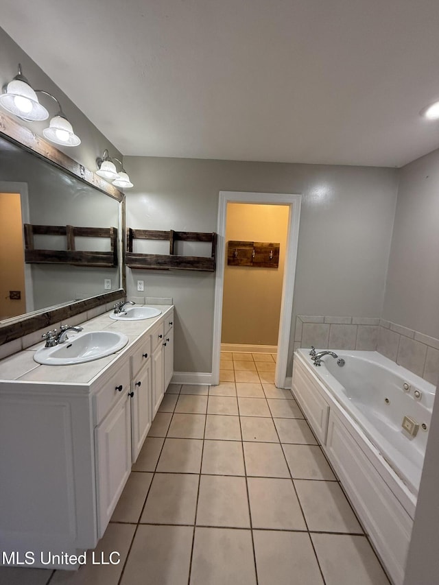 full bathroom featuring double vanity, a sink, a whirlpool tub, and tile patterned floors