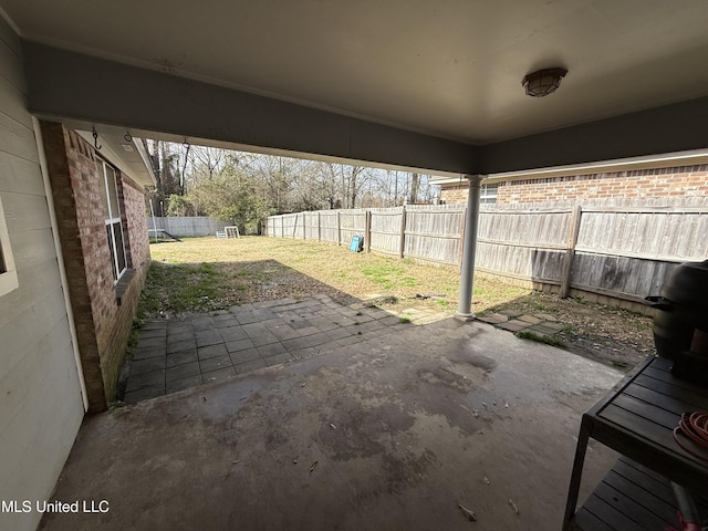 view of patio with a fenced backyard