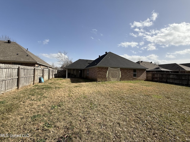 view of yard featuring a fenced backyard