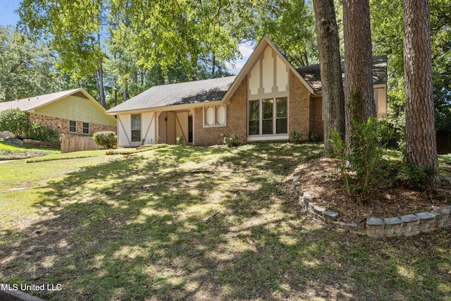 465 Heritage Pl, Jackson, MS 39212 - rear view of house with a yard and brick siding