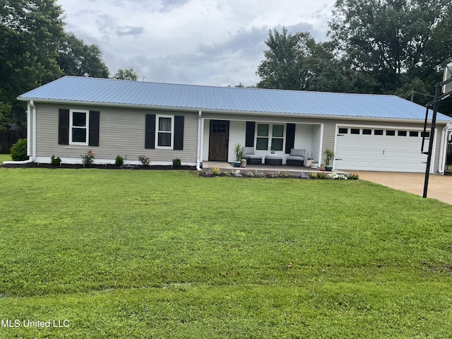 137 Phil Ln, Sardis, MS 38666 - single story home featuring a garage, a front lawn, concrete driveway, and a metal roof