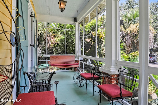 sunroom with plenty of natural light