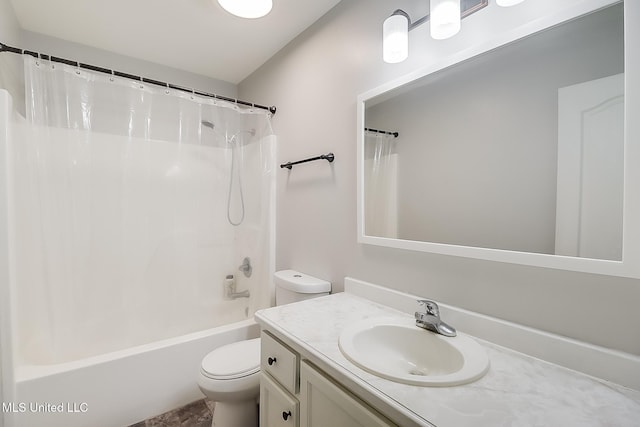 full bathroom with shower / bath combo, vanity, and toilet