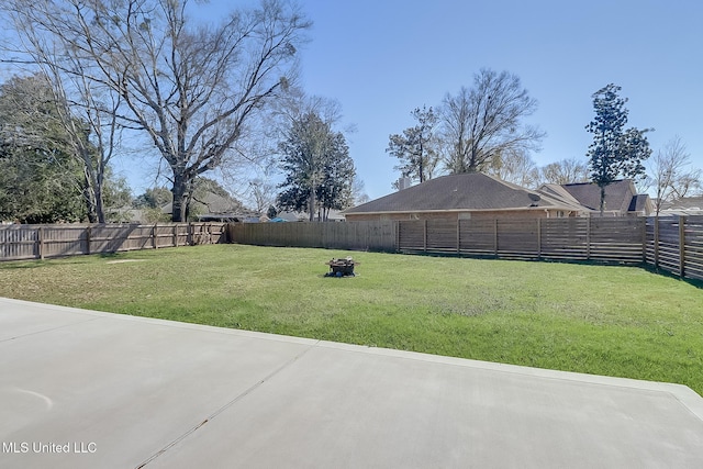 view of yard with a fenced backyard