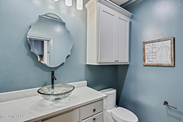 bathroom with vanity and toilet