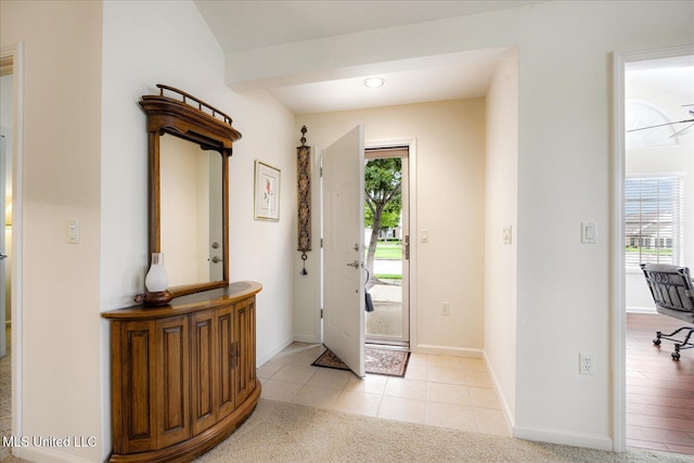 8761 Parkview Oaks Cir, Olive Branch, MS 38654 - foyer entrance featuring baseboards and light tile patterned flooring