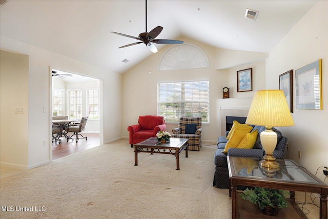 8761 Parkview Oaks Cir, Olive Branch, MS 38654 - living area featuring ceiling fan, light colored carpet, baseboards, and high vaulted ceiling
