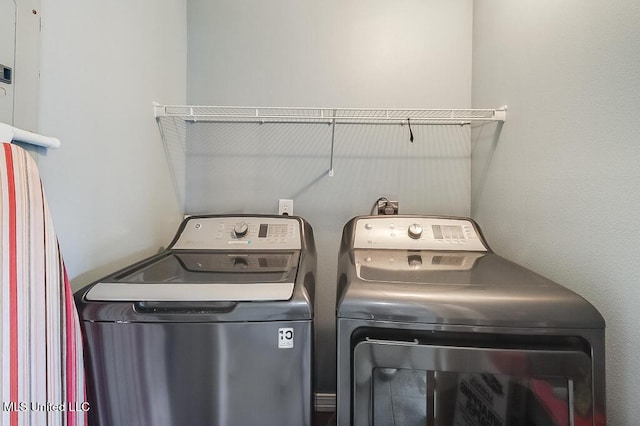 laundry room with washer and dryer