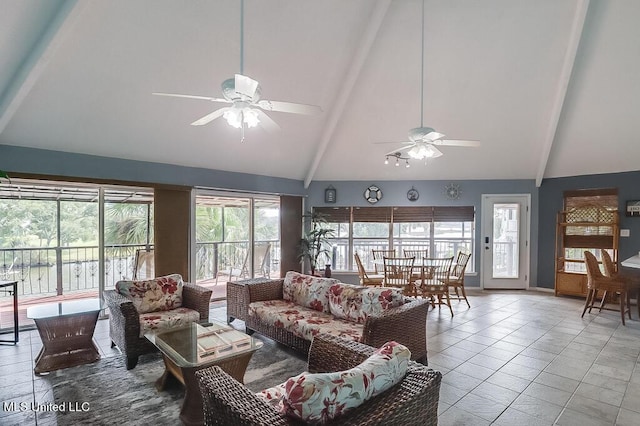 tiled living room with beam ceiling, ceiling fan, and high vaulted ceiling