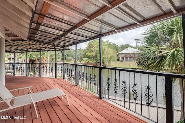 deck featuring a water view