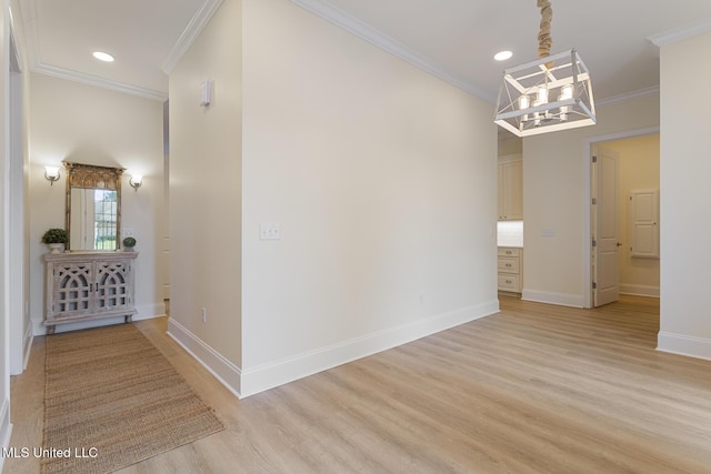 interior space featuring baseboards, recessed lighting, light wood-type flooring, and crown molding