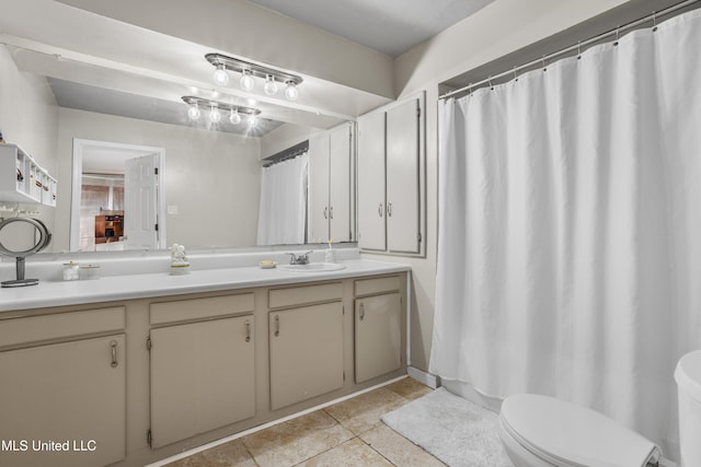 bathroom with tile patterned flooring, vanity, toilet, and a shower with shower curtain