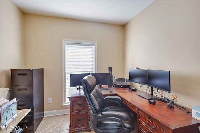 office with a wealth of natural light and light tile patterned floors