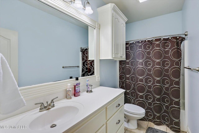 full bathroom with tile patterned flooring, vanity, shower / bath combination with curtain, and toilet