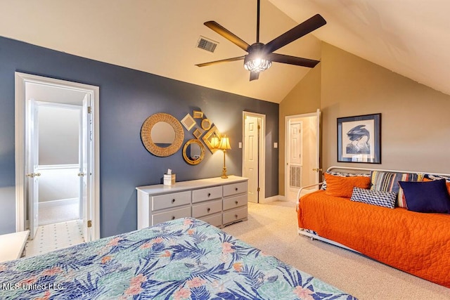 bedroom featuring lofted ceiling, light colored carpet, and ceiling fan