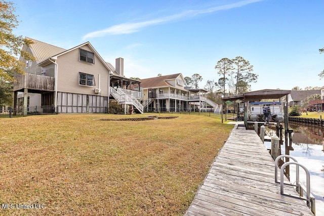 exterior space with a yard and a water view