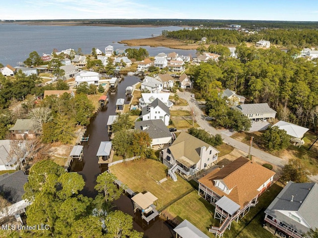 bird's eye view with a water view