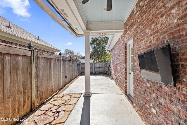 view of patio with fence